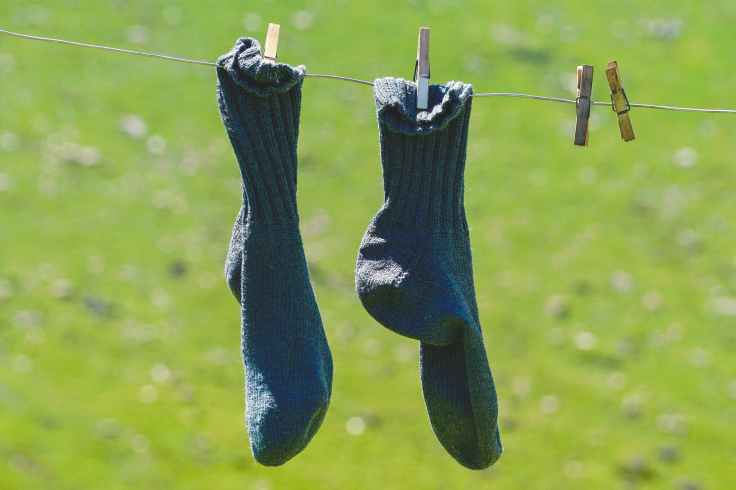 pair of blue socks hanging